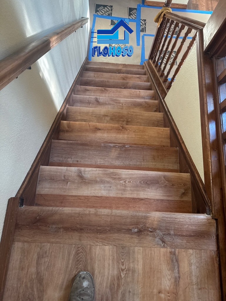 Luxury vinyl plank stair installation in Colorado home